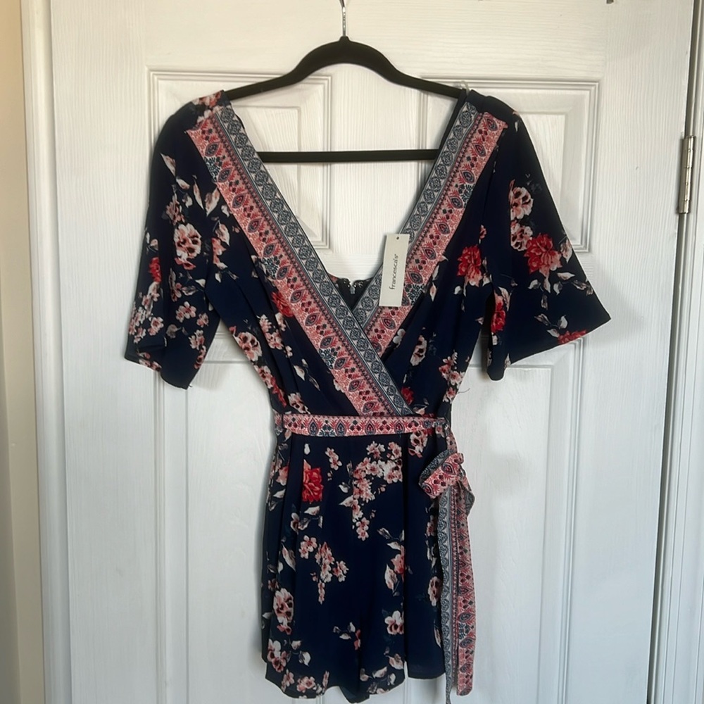 NWT Francesca’s Navy blue floral Romper
